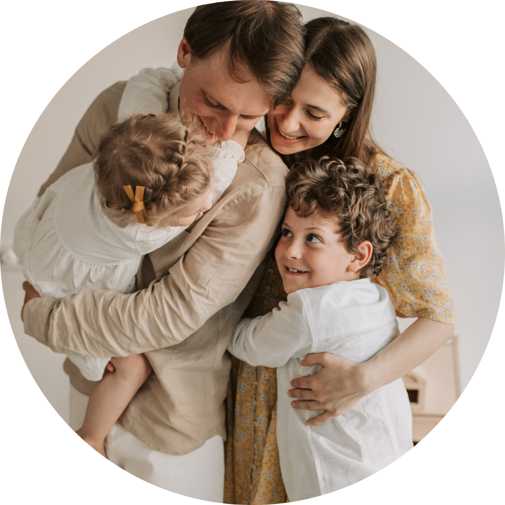 Family hugging after saving money with member perks